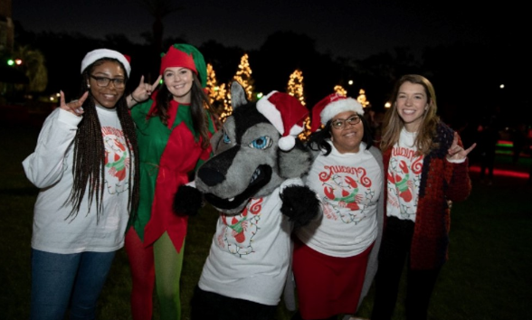 People wearing red and green